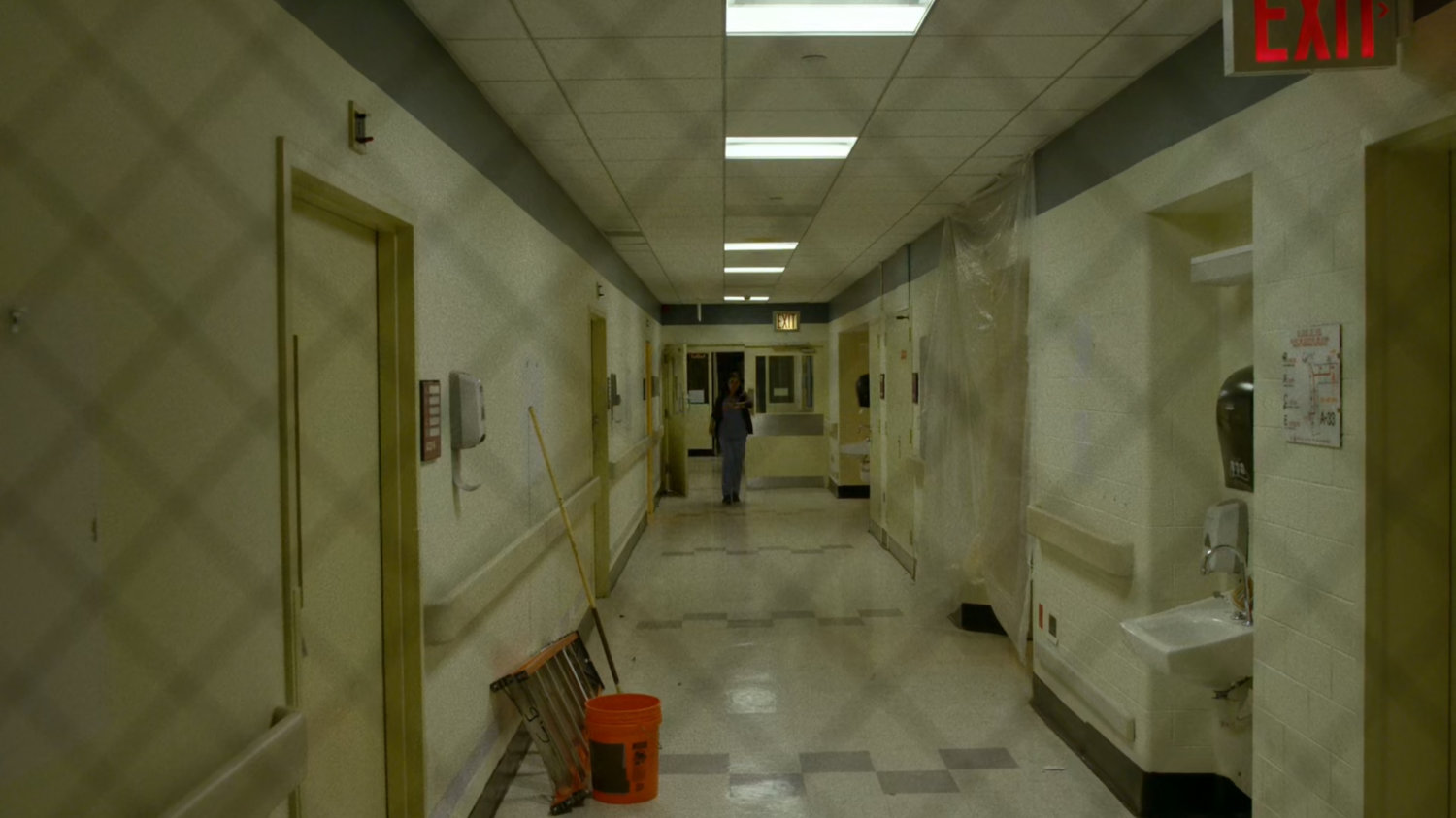 Claire in a hallway in a remodeled wing of Metro-General.