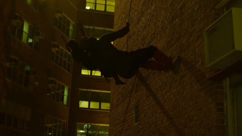 Hand Ninjas climb cables outside Metro-General hospital.