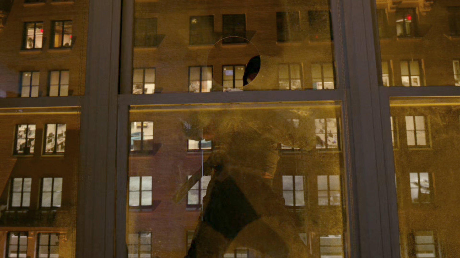 Hand Ninja enter a window outside Metro-General hospital.