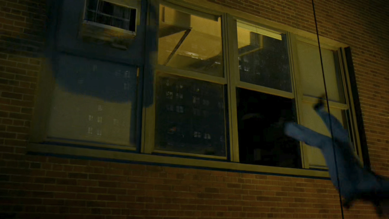 Claire thrown through a window outside Metro-General hospital.