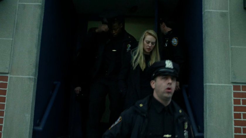 Karen and Officers exiting the 15th Precinct.