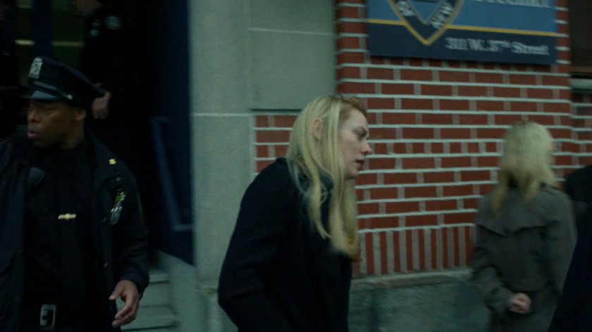 Karen and Officers exiting the 15th Precinct.