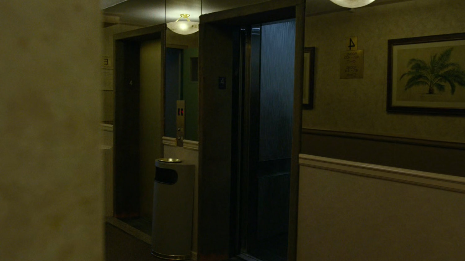 The elevator lobby on the fourth floor of the Hotel Travel Inn.