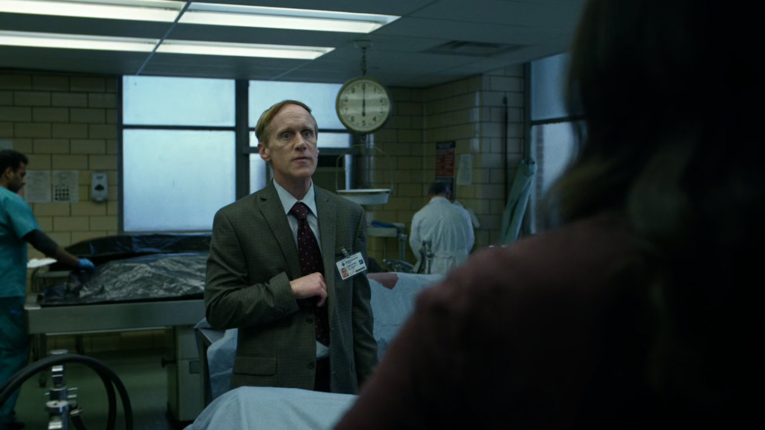 A Hospital administrator in the Metro-General morgue.