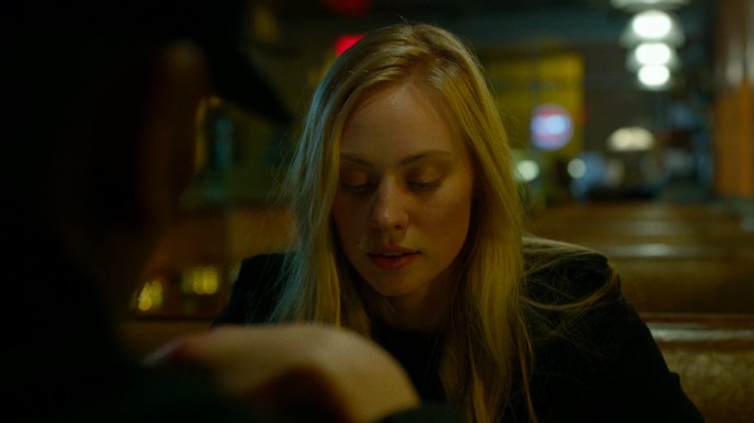 Karen in an empty diner.