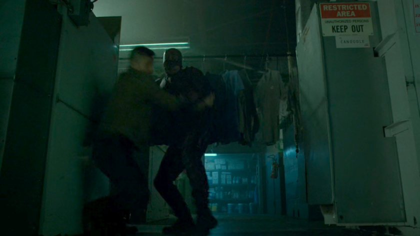 Daredevil fighting a man in a Chinese laundry.