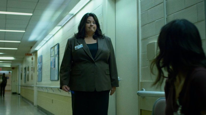 Shirley and Claire in the administrative hallway of Metro-General hospital.
