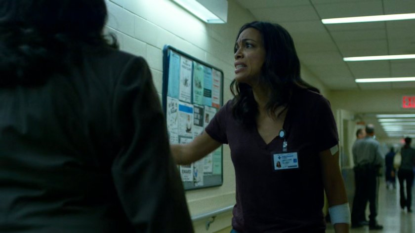 Shirley and Claire in the administrative hallway of Metro-General hospital.