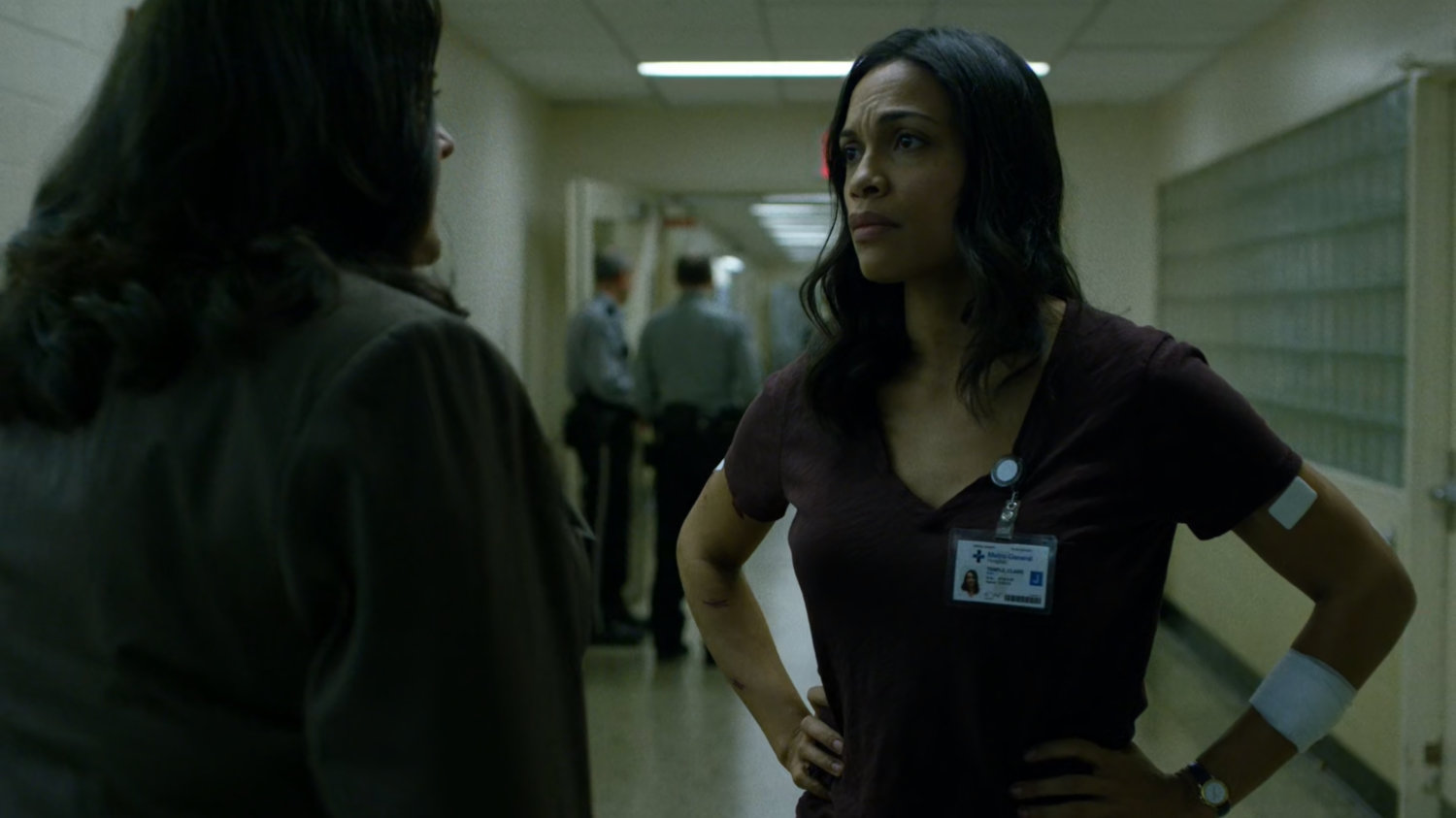 Shirley and Claire in the administrative hallway of Metro-General hospital.