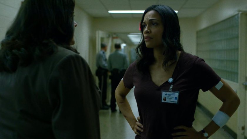 Shirley and Claire in the administrative hallway of Metro-General hospital.
