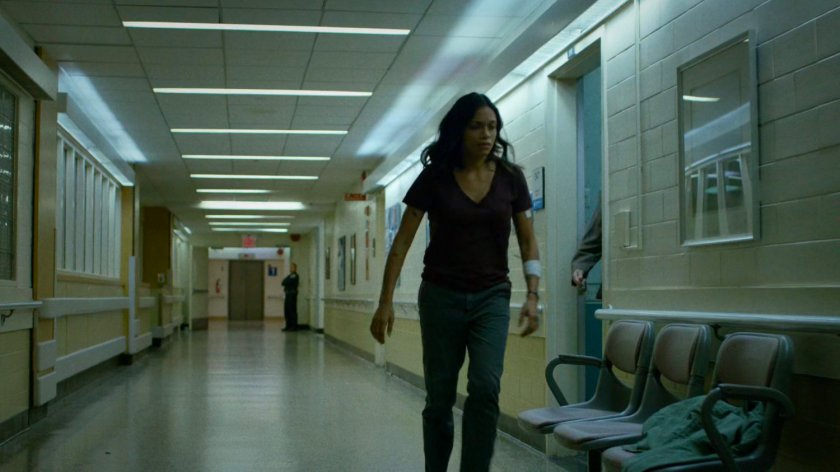 Claire in the administrative hallway of Metro-General hospital.