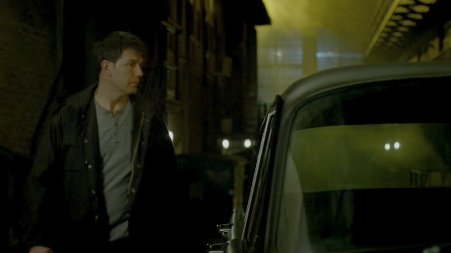 A Chaste member exits their headquarters and gets into a car.