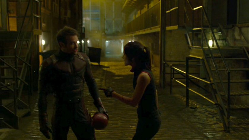Daredevil and Elektra in the alley outside the Chaste headquarters.