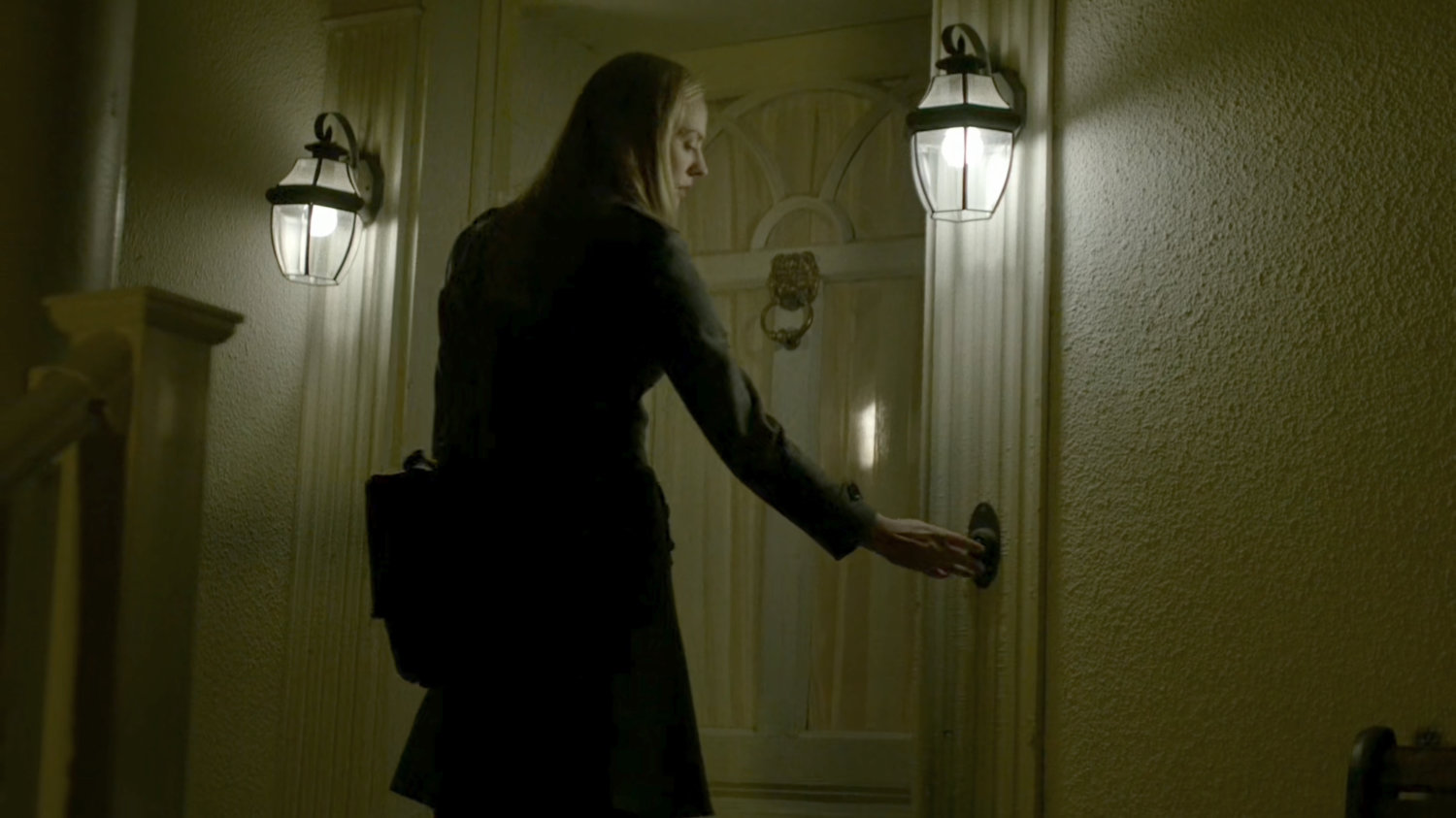 Karen rings the doorbell at Schoonover's house.