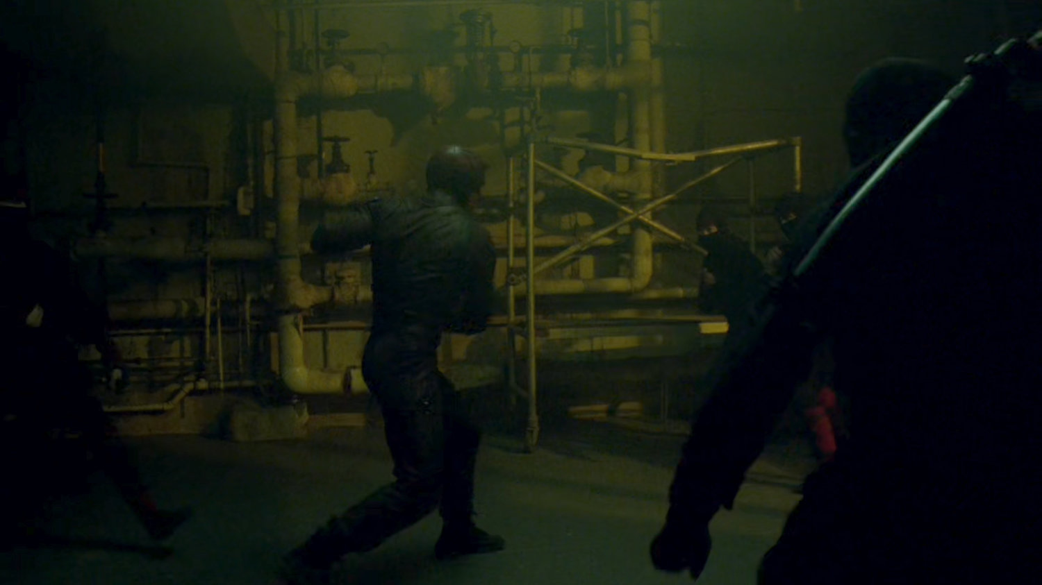 Daredevil fights the Hand in an abandoned steam plant.
