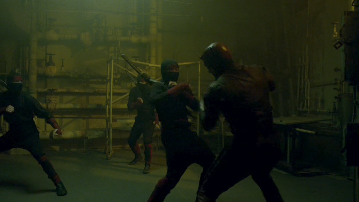Daredevil fights the Hand in an abandoned steam plant.