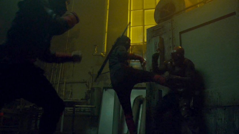 Daredevil fights the Hand in an abandoned steam plant.