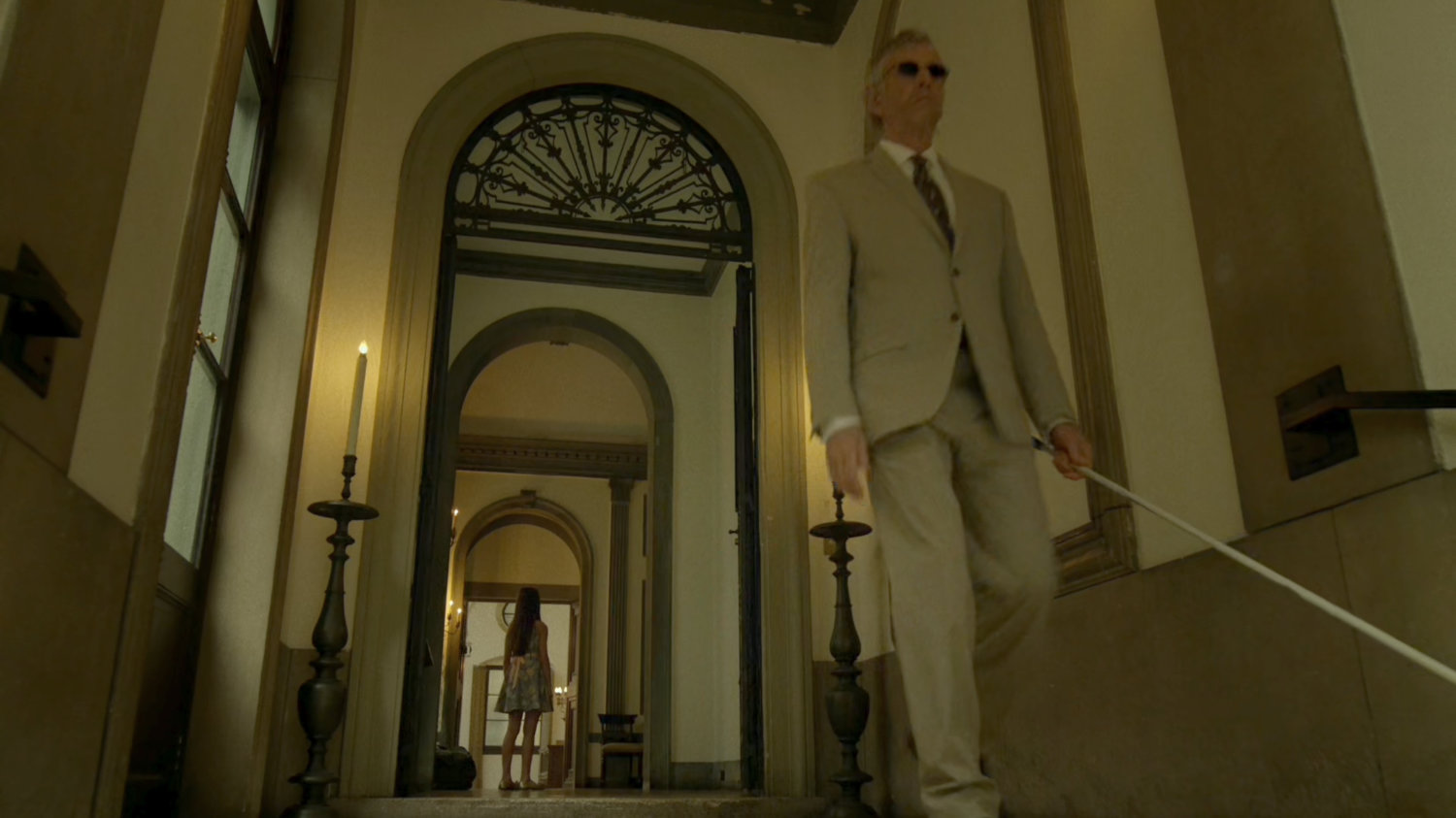 Stick walking out of Natchios Mansion.