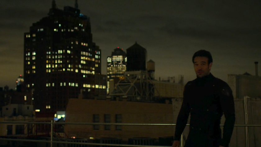 Matt standing on the roof of his apartment building.