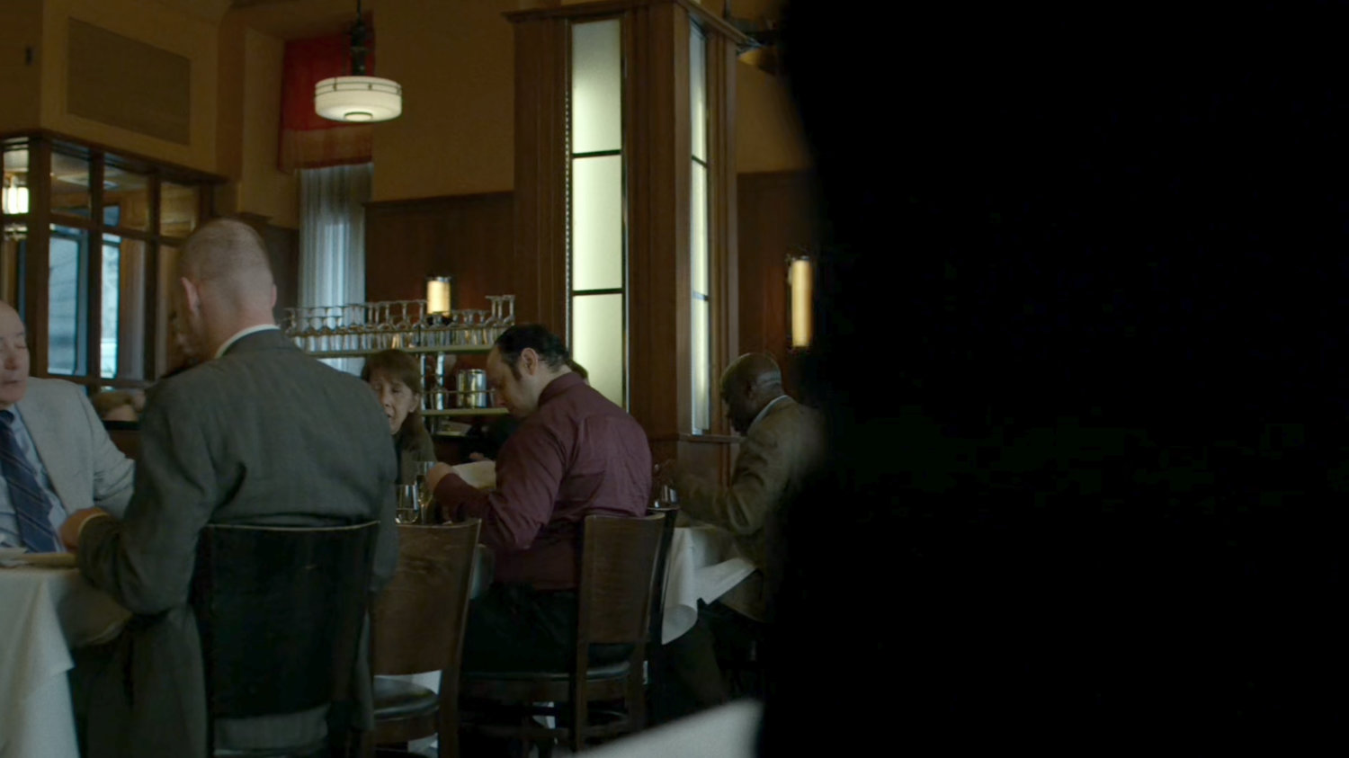 Diners in an upscale restaurant.