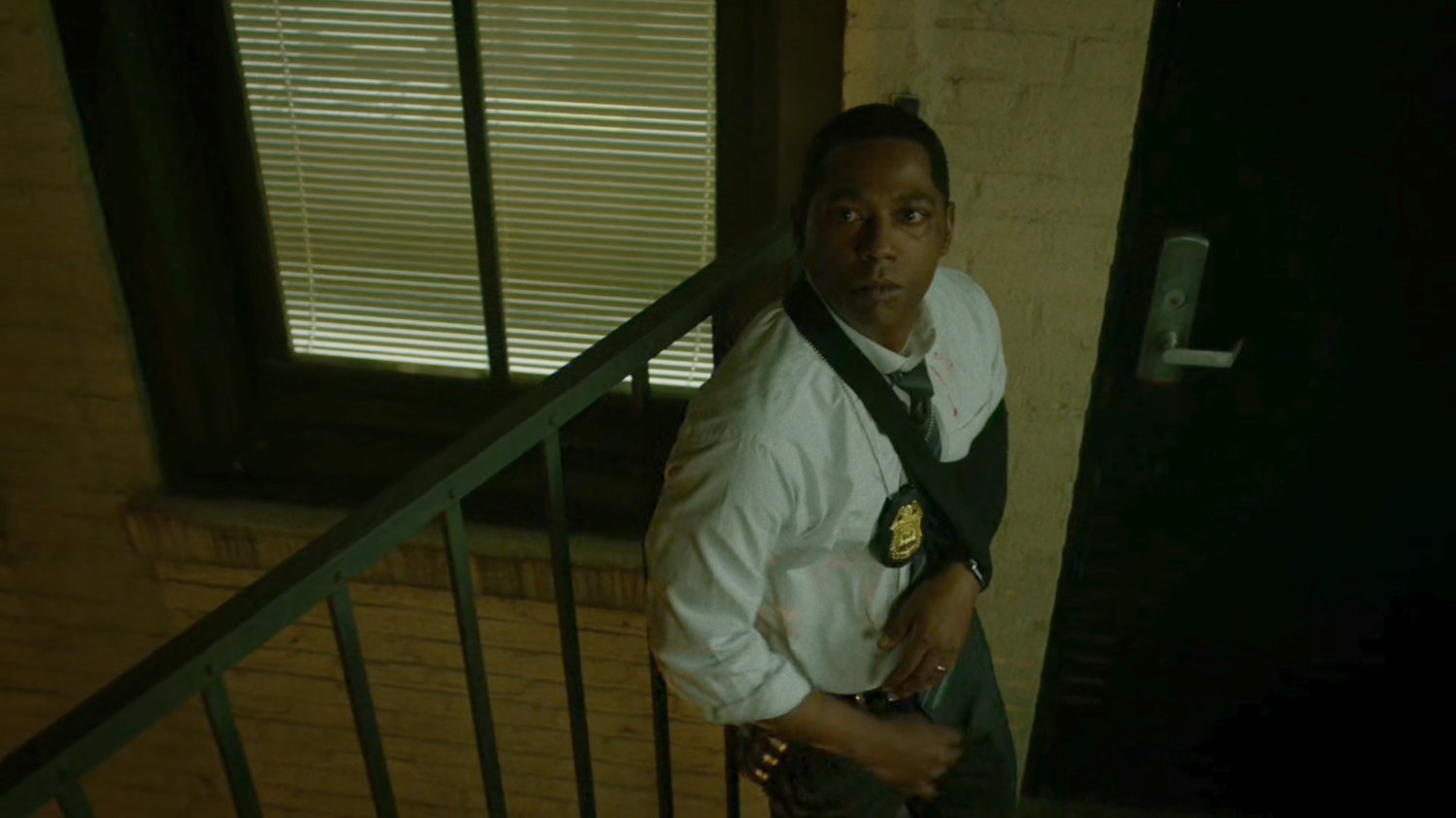 Brett Mahoney on the fire escape outside the 15th Precinct.