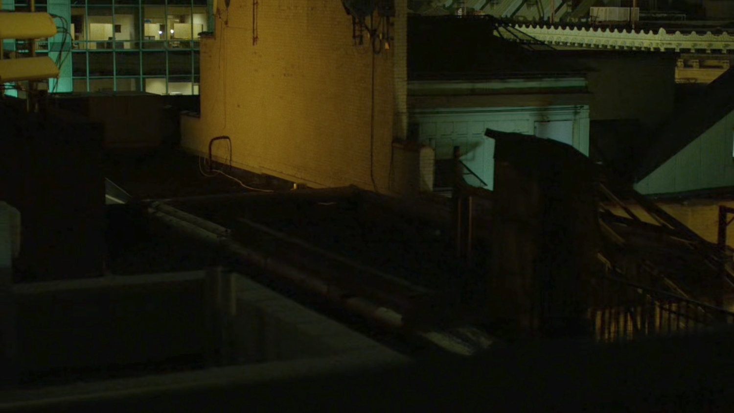 Daredevil's POV of rooftops from a New York rooftop.