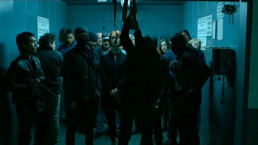 Hand soldiers and hostages in a freight elevator.