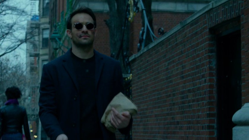 Matt walking along a sidewalk.