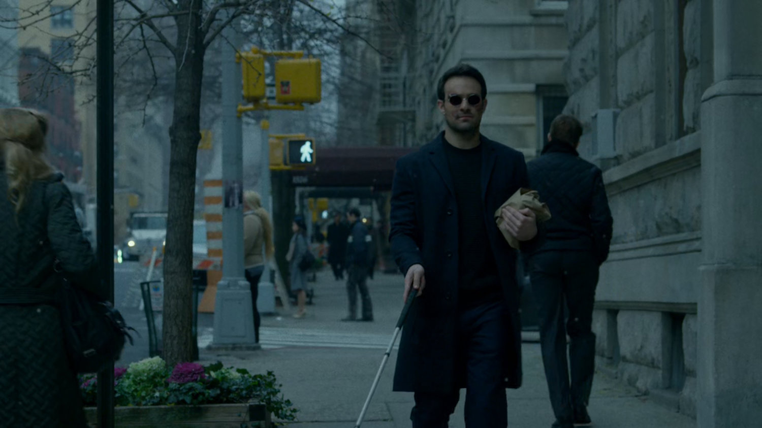 Matt walking along a sidewalk.