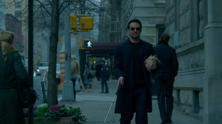 Matt walking along a sidewalk.