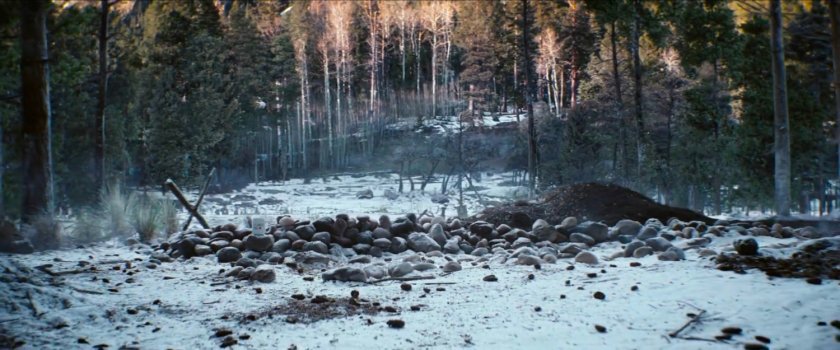 Makeshift burial site in snowy North Dakota woods.