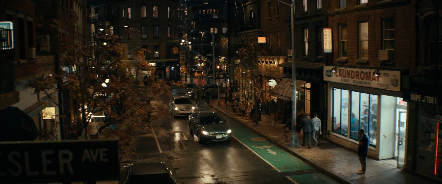 High angle night time view of city street.
