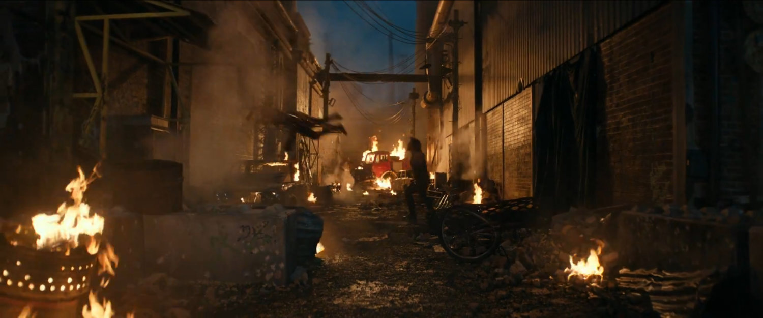 Deadpool and Age of X Wolverine in apocalyptic alley.