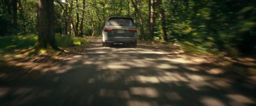 Minivan driving along road in The Void's Borderlands.