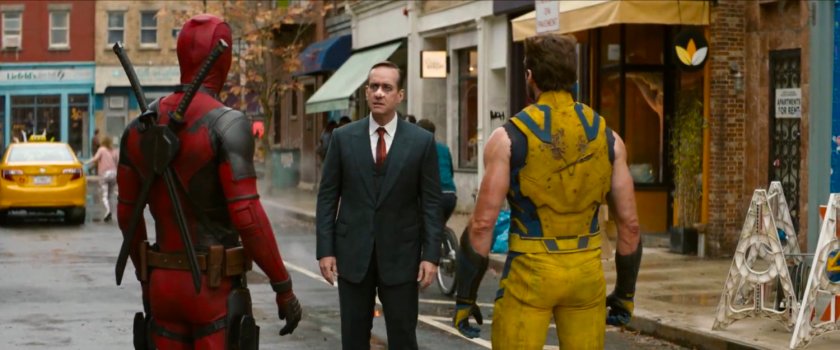 Deadpool and Wolverine confront Paradox on city street.