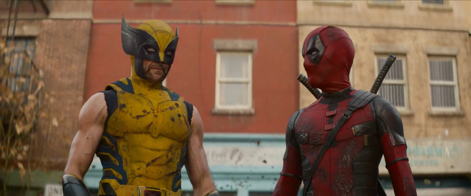 Wolverine and Deadpool in full costumes.