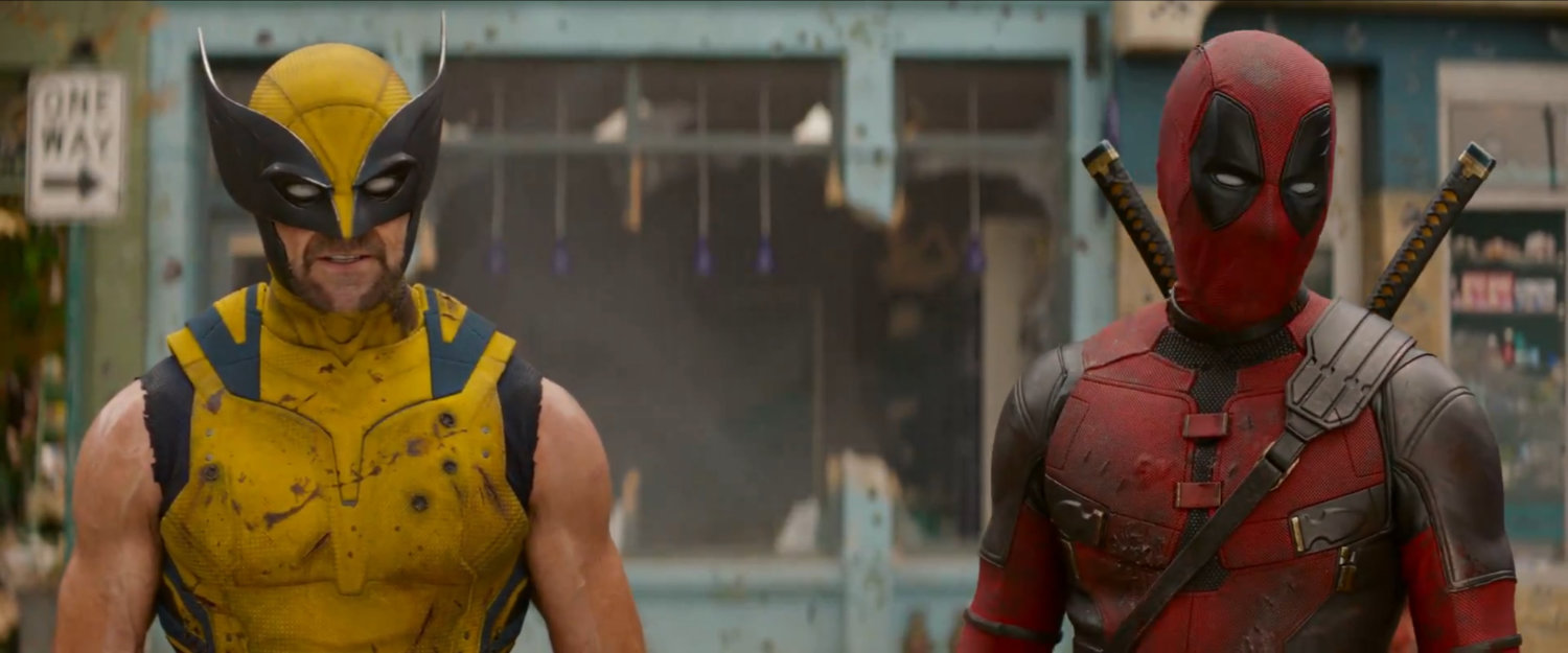 Wolverine and Deadpool in full costumes.