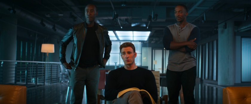 Rhodey, Sam and Steve in the Avengers HQ sitting area.