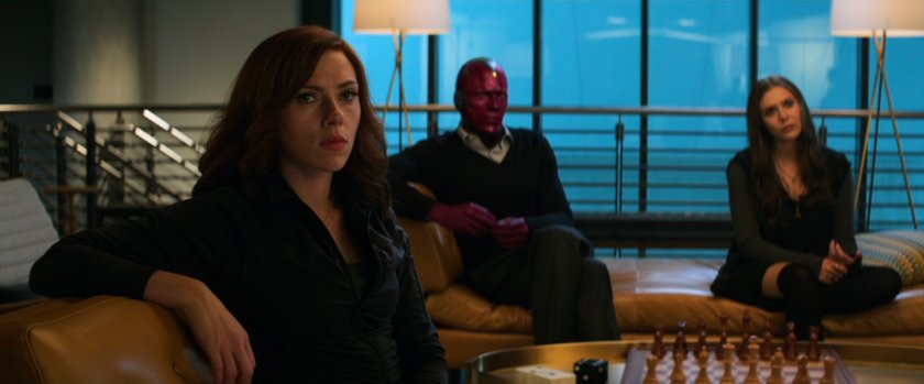 Natasha, Vision, and Wanda in the Avengers HQ sitting area.