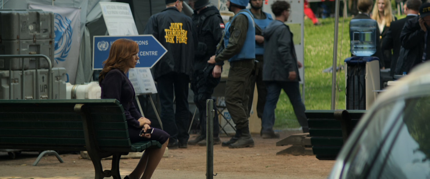 Natasha on a bench in a park in Vienna after a bombing.