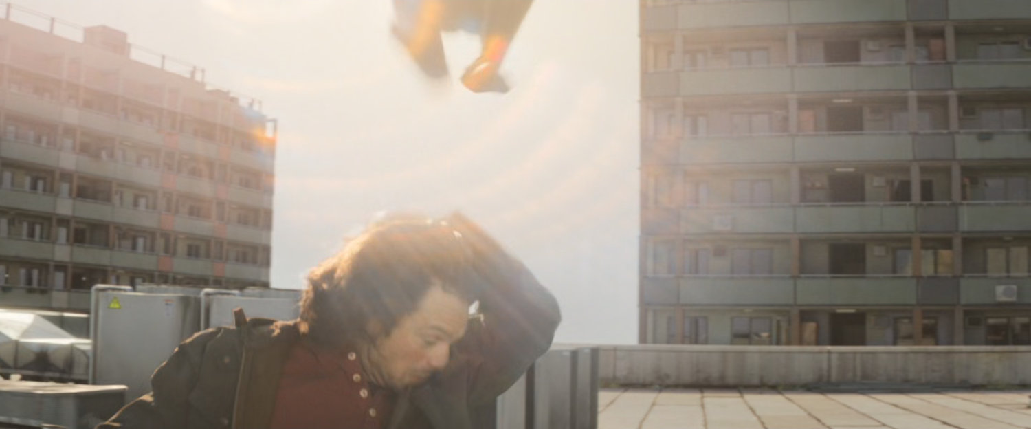 Bucky avoiding T'challa attack on Bucharest rooftop.