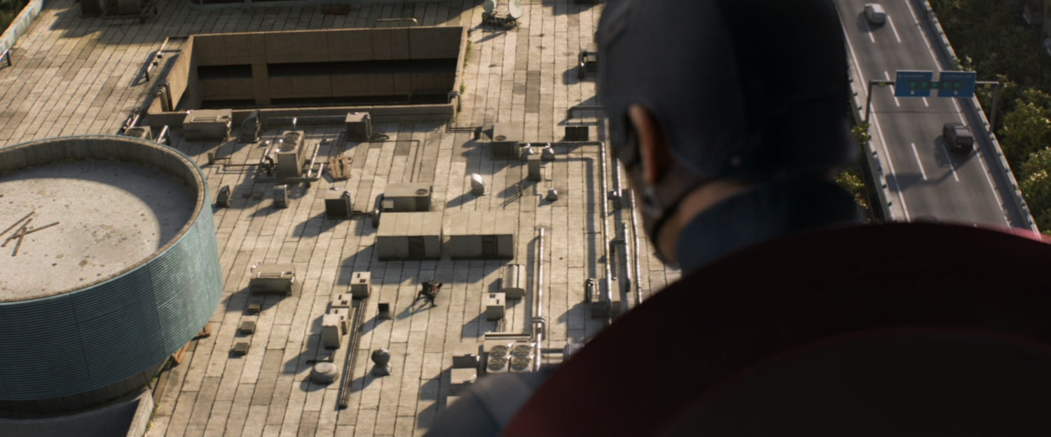 High angle view of Steve looking onto Bucharest rooftop.