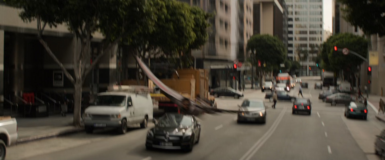 Falcon buzzing over a Bucharest street.