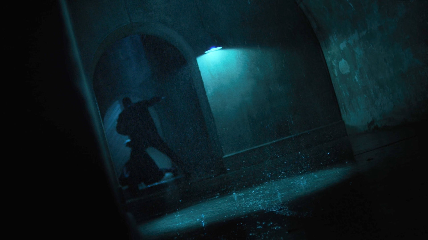 Two characters fighting in the sewers of Phnom Penh.