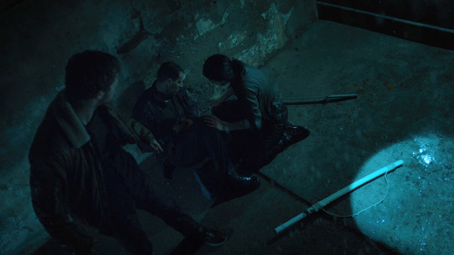 Danny Rand and Colleen Wing stand over a dead man in the sewers of Phnom Penh.