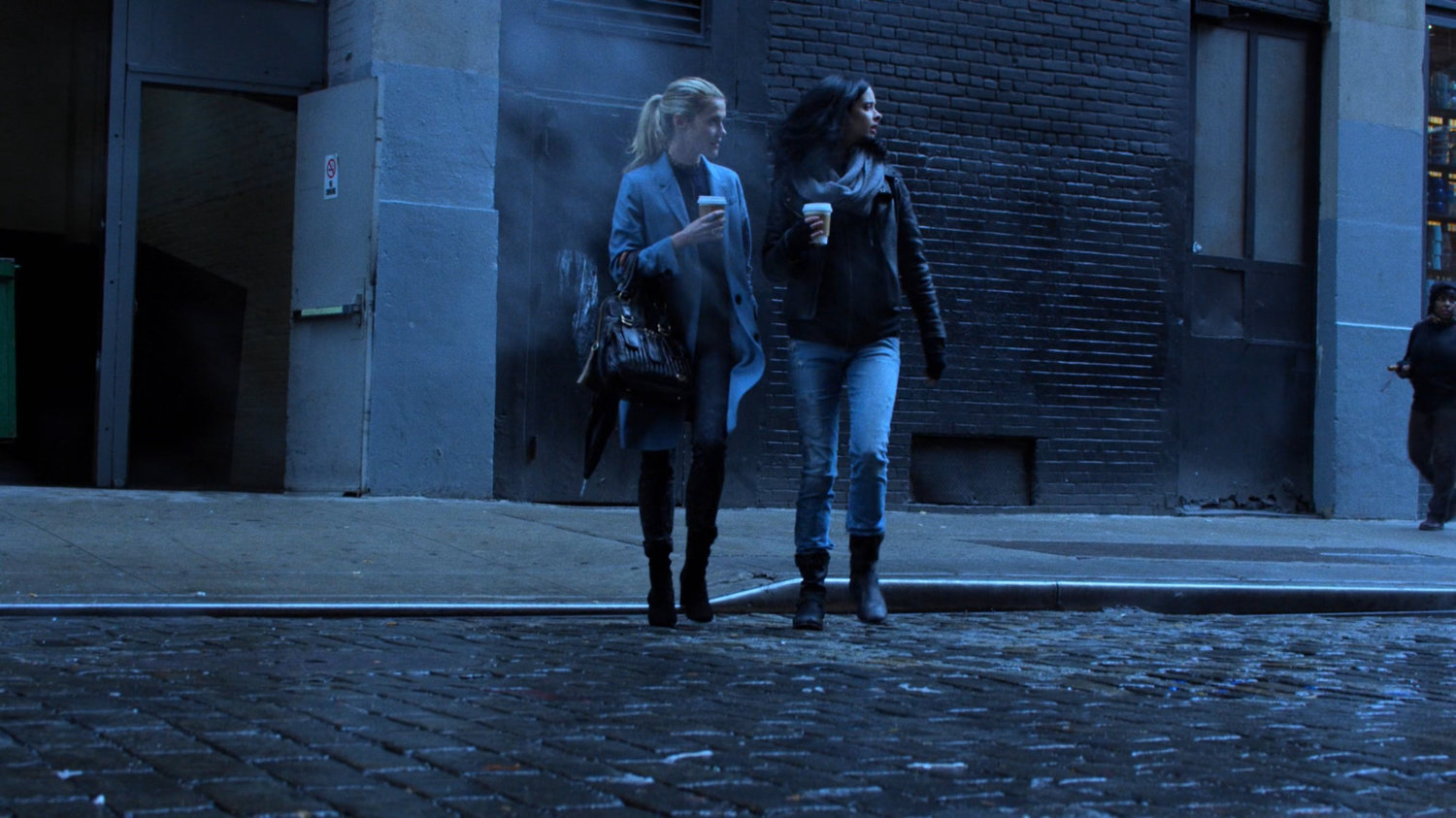 Trish and Jessica crossing a street.