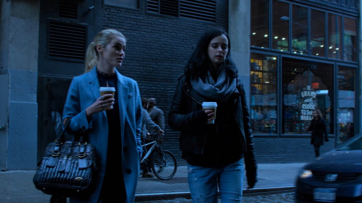 Trish and Jessica crossing a street.