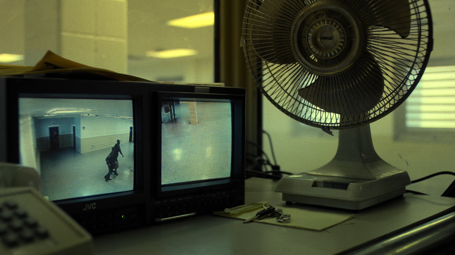 Video monitors on desk at Seagate prison.