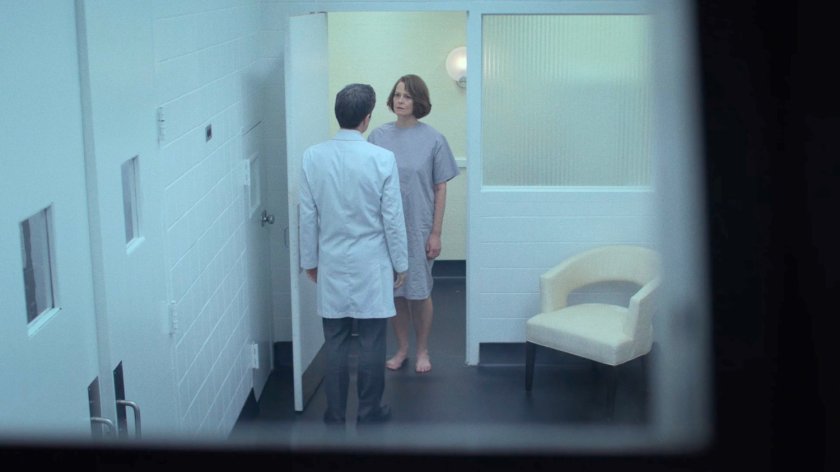 Alexandra Reid speaking with doctor outside of MRI room of hospital.