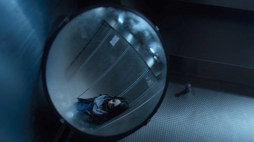 Reflection of Jessica Jones in the elevator of her building.